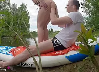 Outdoor river trip turns intimate for couple.