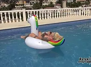 Aviva rocks masturbates on a unicorn, showcasing her big tits and ass with tattoo