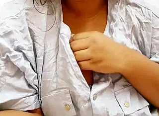 Latina girl with big tits poses sexily