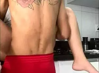 boss forces employee in the kitchen for a quick encounter