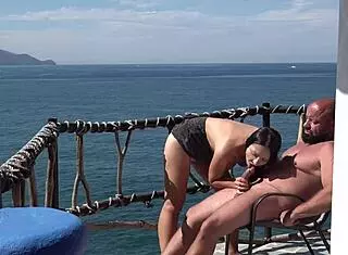 Alice Sweet performs oral on skinny European guy with natural tits on beach