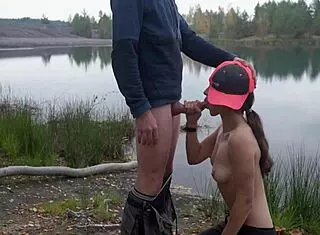 brunette outdoor blowjob by the lake