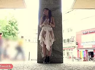 Funk city - Jeny Smith struts naked in transparent dress publicly