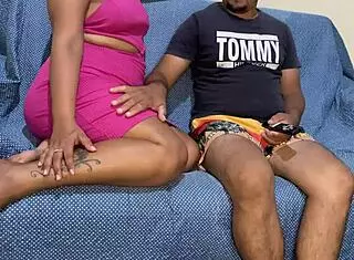 Brunette Sits On Dick In Dress While Watching TV