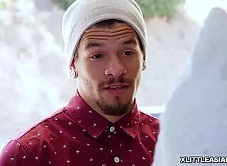 Asian teen Elle Voneva spreads legs wide to show tiny hairy pussy.