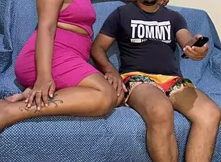 Brunette Sits On Dick In Dress While Watching TV