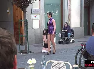 Busty Woman In Heels Publicly Submits To Domination In Front Of Crowding Voyeurs