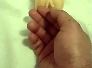 Fuck doll gets artificial pussy fingered hard!