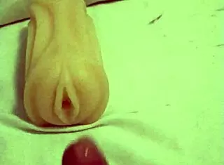 Fuck doll gets artificial pussy fingered hard!