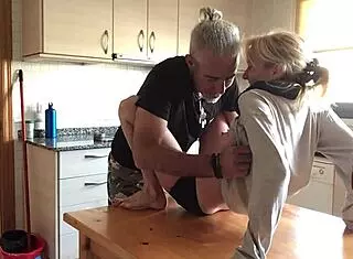 Blonde Mature Babe And Couple Share Intimate Kitchen Moments