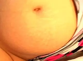 pregnant redhead toys herself before hard banging