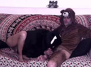 amateur couple in cosplay costumes have sex on the sofa in their pajamas