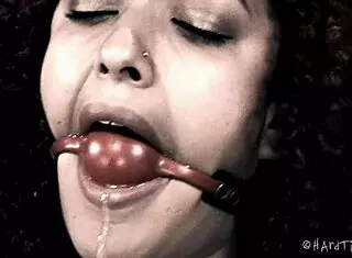 Mixed girl screams during intense bondage session