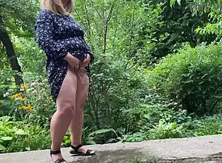 gorgeous milf helps stranger pee outside and wets herself