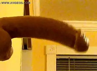 Gay guy deepthroats dildo in hood