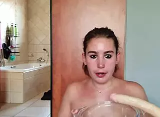 Gathering saliva while fucking throat with double dildo repeatedly