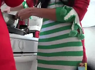 Baking Christmas Cookies In Kitchen With Friend And Couple