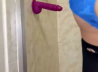 Latina gay man fucks dildo in bathroom