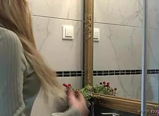 hot new sexy blonde wife switches panties in bathroom solo.