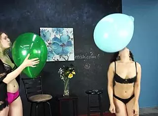 fetish model backstage with balloon