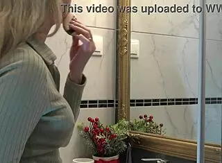 hot new sexy blonde wife switches panties in bathroom solo.