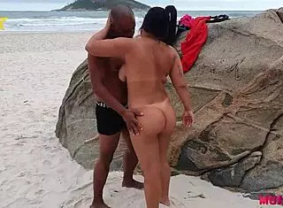 Big-Assed Woman Adventures On Nudist Beach In Rio With Well-Endowed Black Men