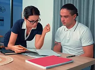 Pretty Teacher Catches Student Jerking Off To Her Photos At Work