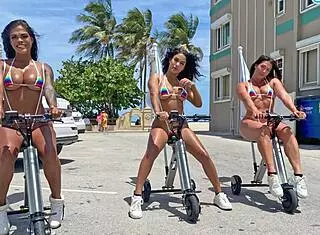 Big ass latinas feel the thrill riding trikes on public beach