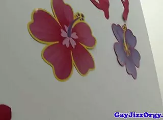 Muscular gay hunks sucking cocks in group blowjob orgy