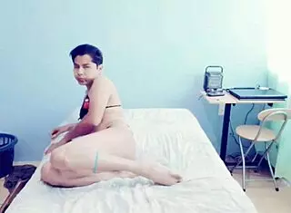 Intriguing Young Gay Man Touches Himself in Bedroom, Crossdressing Tease