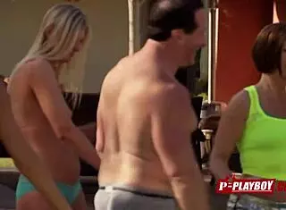 joe and kristen are taking a dip in the pool, foreplaying with other couples around them