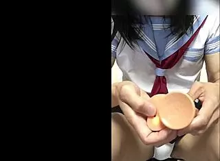 Crossdressing asian in school uniform gets fucked