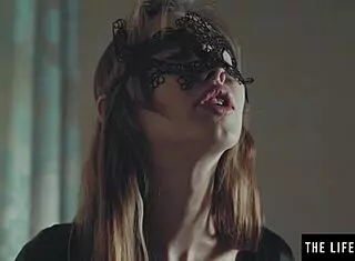 hot blonde domme spanks tits while masturbating in fishnets