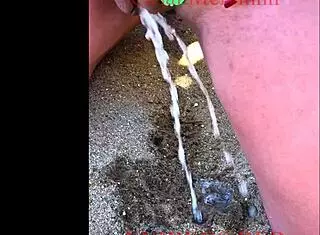 African Wife Pees Long On Beach