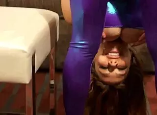This redhead gymnast bends insanely in tight spandex gear.