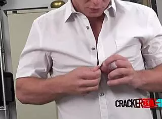 Interracial gay encounter in office setting