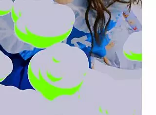 Loona twirls a hula hoop in an energetic performance.