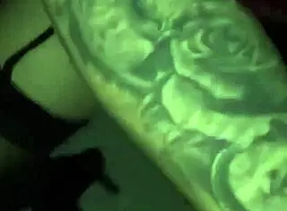 Tattoed goth chick casually sucks stranger's cock in video booth while cuckold watches