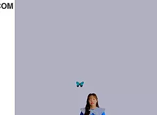 Loona twirls a hula hoop in an energetic performance.