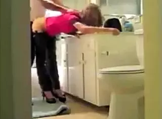 French woman in lingerie interacts with neighbor in kitchen