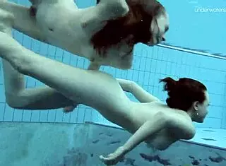 anna and lada relax in pool with bikinis on brunette beauties