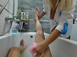 Stepmom ignores stepson’s excitement while washing him. Big tits flash during solo play.