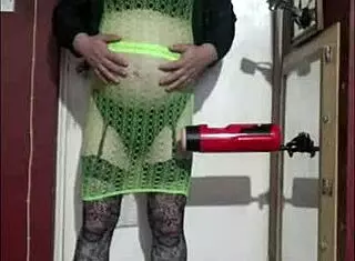 I love watching this shy crossdresser masturbate with a machine at home.