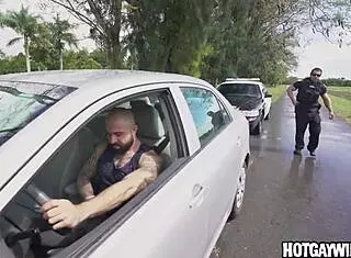cop gets surprised when hunk asks him to pull over for gay fun