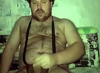 Gay man in red stockings teases with his small cock while flaunting a massive ass for the camera. He knows how to work it!