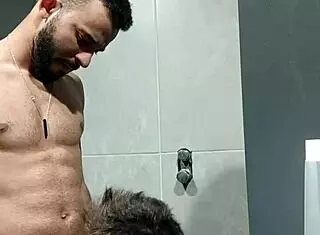 that guy stared at me in the gym, so i took him to the bathroom and made him suck my cock?