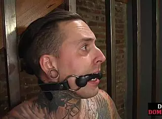 Strict blonde milf ties sub and whips after strapon