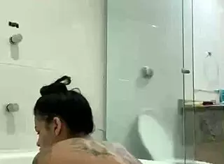 Hot brunette Bia masturbates with lubricating vaginal juices in the bathtub