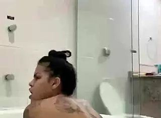 Hot brunette Bia masturbates with lubricating vaginal juices in the bathtub