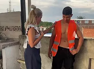 The builder seduces the boss's blonde wife on the outdoor deck. Ann rides him passionately while Angel Cruz watches.